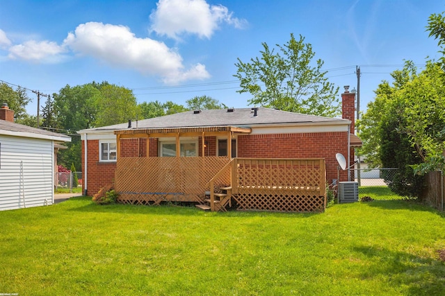 31565 Hayes Rd, Warren, MI 48088 - back of property with brick siding, a chimney, central AC, and a deck