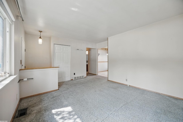 31565 Hayes Rd, Warren, MI 48088 - carpeted empty room with baseboards