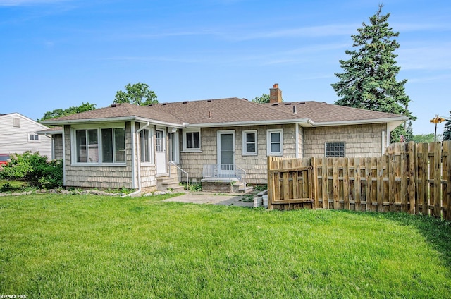 17844 Stephens St, Eastpointe, MI 48021 - back of house with a chimney, entry steps, and roof with shingles
