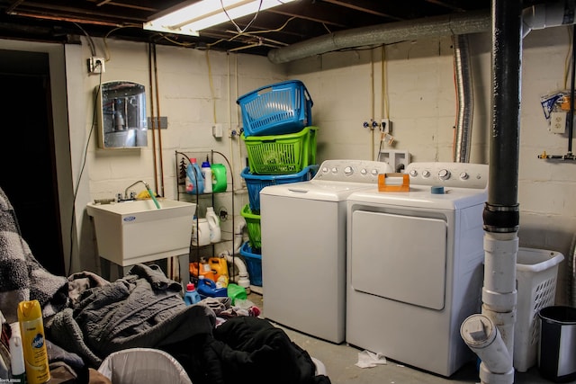 1002 Garfield St, Port Huron, MI 48060 - laundry room featuring independent washer and dryer and concrete block wall