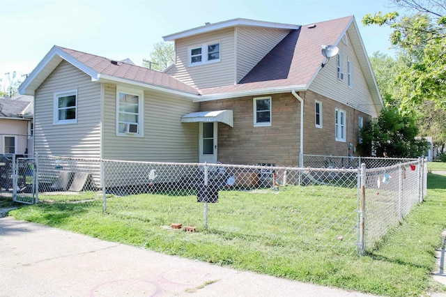 1002 Garfield St, Port Huron, MI 48060 - view of front of house featuring stone siding and roof with shingles