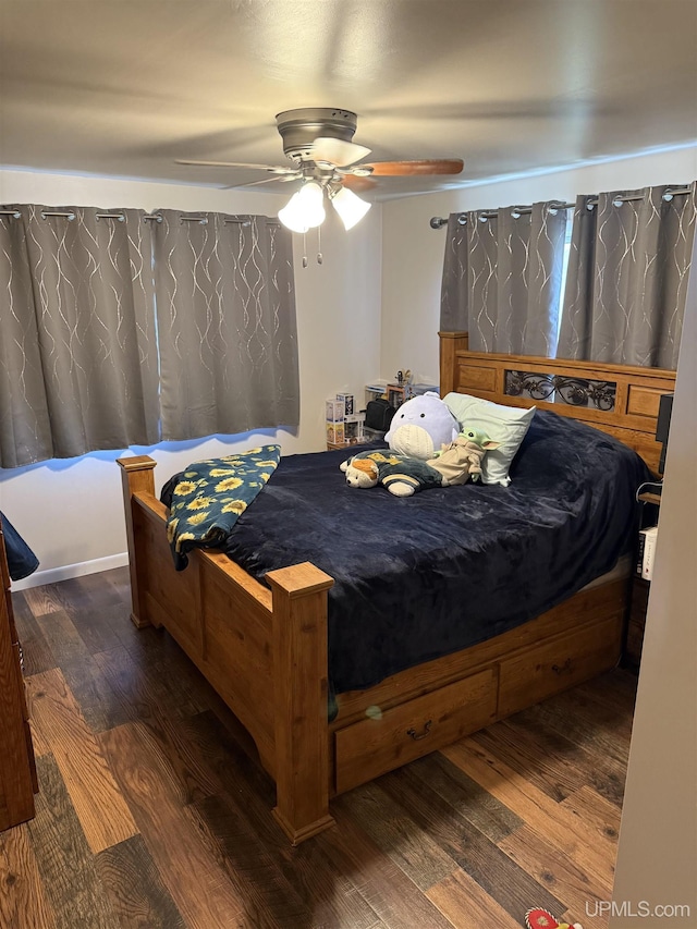 8096 Garth Point 25.25 Ln Rd, Rapid River, MI 49878 - bedroom featuring wood finished floors and a ceiling fan