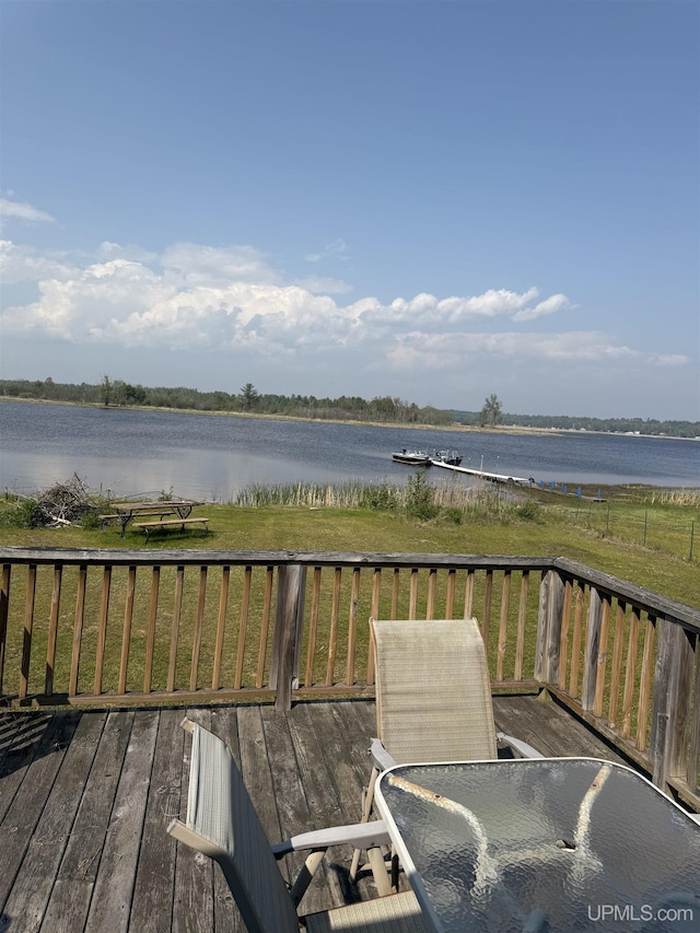 8096 Garth Point 25.25 Ln Rd, Rapid River, MI 49878 - wooden deck with a water view