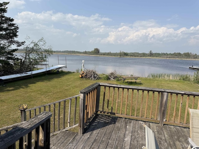 8096 Garth Point 25.25 Ln Rd, Rapid River, MI 49878 - wooden deck featuring a water view and a lawn
