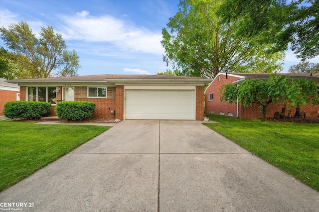 14108 La Chene Ave, Warren, MI 48088 - ranch-style house featuring brick siding, an attached garage, driveway, and a front lawn