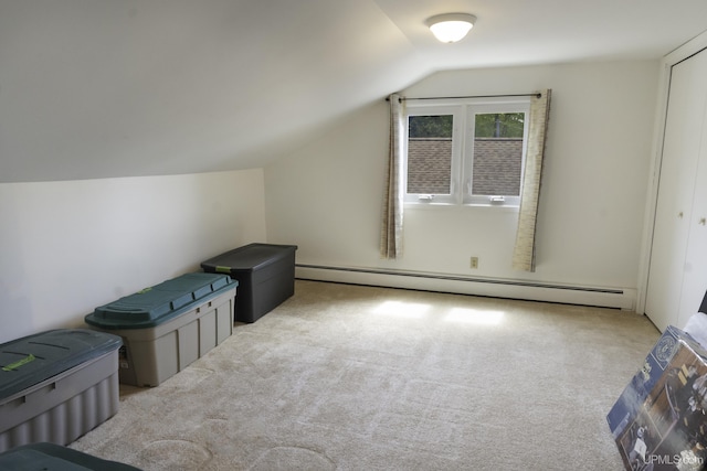 1426 Washington St, Munising, MI 49862 - bonus room with a baseboard radiator, vaulted ceiling, and carpet floors