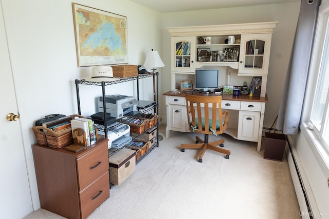1426 Washington St, Munising, MI 49862 - office area featuring a baseboard heating unit and light colored carpet