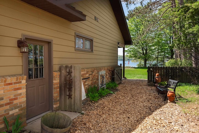 1426 Washington St, Munising, MI 49862 - entrance to property featuring a water view and brick siding