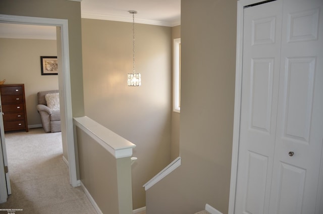 4896 Royal Cove Dr, Shelby Twp, MI 48316 - hallway with an upstairs landing, crown molding, light colored carpet, and baseboards