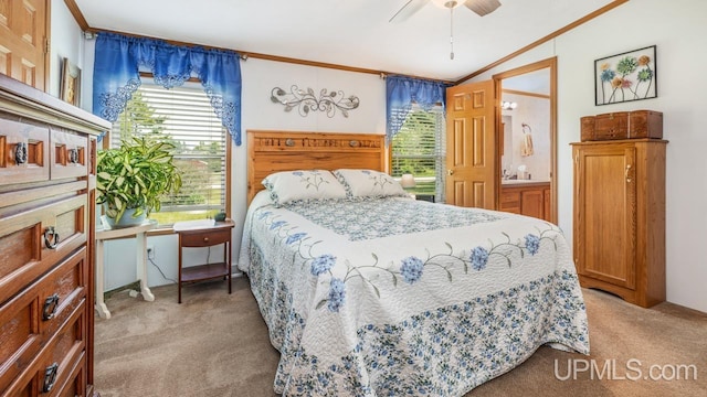 11745 T Rd, Rapid River, MI 49878 - bedroom featuring light colored carpet, crown molding, vaulted ceiling, and ceiling fan