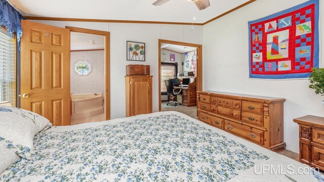 11745 T Rd, Rapid River, MI 49878 - bedroom with crown molding, carpet floors, a desk, ceiling fan, and lofted ceiling