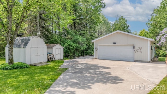 11745 T Rd, Rapid River, MI 49878 - detached garage featuring a shed