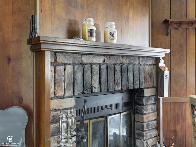 7150 Denissen St, Lexington, MI 48450 - detailed view of a brick fireplace and wooden walls