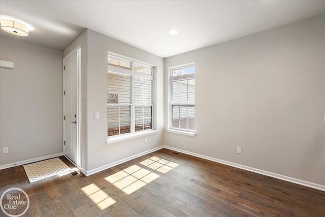 3091 Bridgewater Rd Unit # 28, Auburn Hills, MI 48326 - empty room with baseboards, dark wood-type flooring, and recessed lighting
