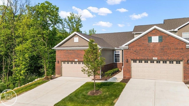 3091 Bridgewater Rd Unit # 28, Auburn Hills, MI 48326 - traditional home featuring driveway, brick siding, and a garage