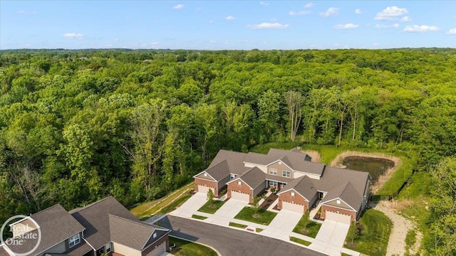 3091 Bridgewater Rd Unit # 28, Auburn Hills, MI 48326 - aerial view of property and surrounding area with a heavily wooded area