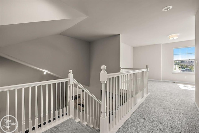 3095 Bridgewater Rd Unit # 30, Auburn Hills, MI 48326 - staircase with carpet, baseboards, and vaulted ceiling