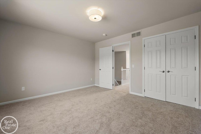 3095 Bridgewater Rd Unit # 30, Auburn Hills, MI 48326 - unfurnished bedroom with carpet, baseboards, and a closet