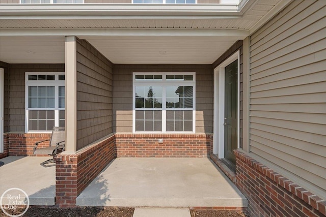 3095 Bridgewater Rd Unit # 30, Auburn Hills, MI 48326 - property entrance featuring brick siding and covered porch