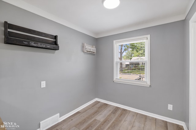 23016 California St, Saint Clair Shores, MI 48080 - unfurnished room featuring light wood-type flooring and baseboards