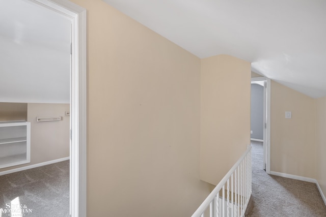 23016 California St, Saint Clair Shores, MI 48080 - corridor with carpet, vaulted ceiling, and baseboards