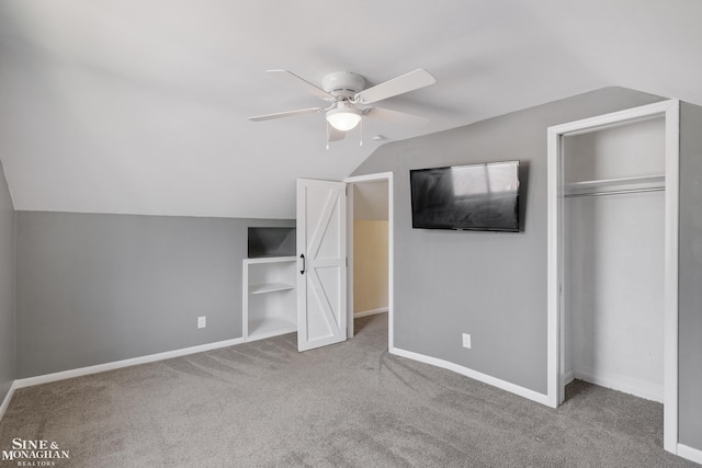 23016 California St, Saint Clair Shores, MI 48080 - unfurnished bedroom with vaulted ceiling, carpet flooring, baseboards, a closet, and ceiling fan