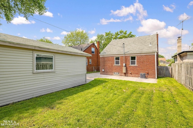 23016 California St, Saint Clair Shores, MI 48080 - back of property with a patio, central AC, brick siding, and crawl space