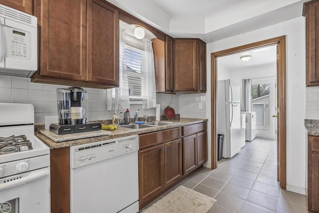 22301 Saint Gertrude St, Saint Clair Shores, MI 48081 - kitchen featuring white appliances, a sink, tasteful backsplash, and tile patterned floors