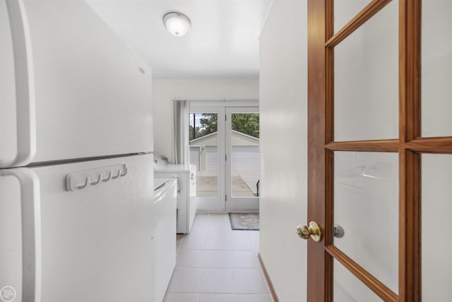 22301 Saint Gertrude St, Saint Clair Shores, MI 48081 - laundry room with washer and clothes dryer and light tile patterned floors