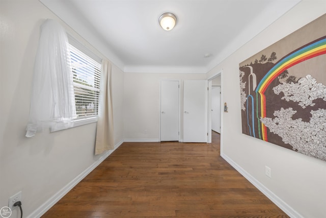 22301 Saint Gertrude St, Saint Clair Shores, MI 48081 - hallway featuring wood finished floors and baseboards