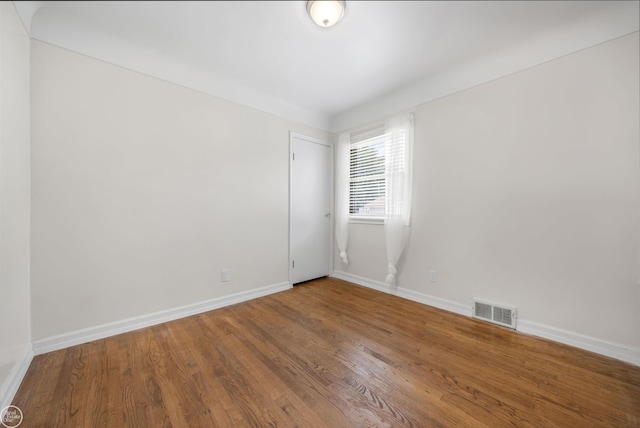 22301 Saint Gertrude St, Saint Clair Shores, MI 48081 - spare room featuring baseboards and wood finished floors