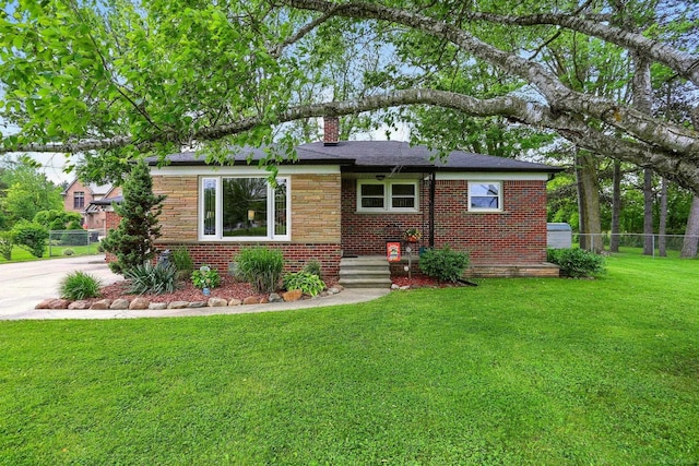 14810 28 Mile Rd, Washington, MI 48094 - view of front facade with brick siding, a chimney, and concrete driveway