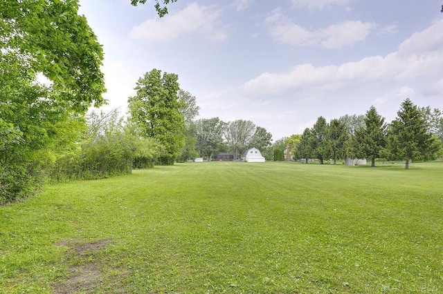14810 28 Mile Rd, Washington, MI 48094 - view of green lawn with a barn