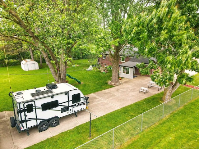 14810 28 Mile Rd, Washington, MI 48094 - view of patio featuring a playground
