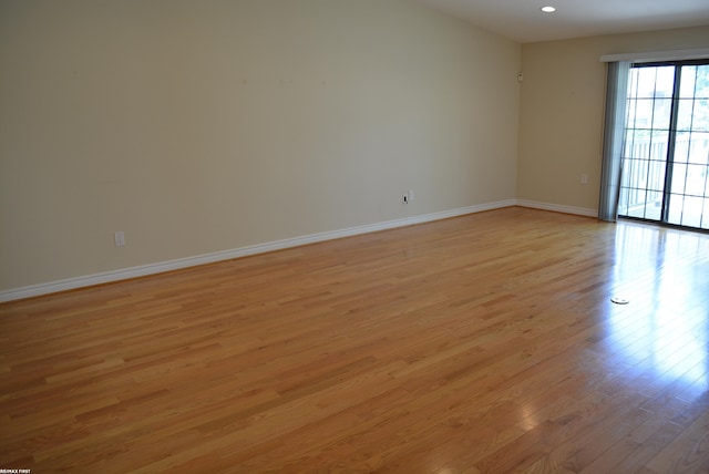 2423 Birchcrest Ct, Sterling Heights, MI 48314 - spare room with light wood-type flooring, baseboards, and recessed lighting