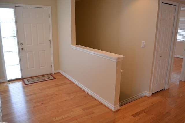2423 Birchcrest Ct, Sterling Heights, MI 48314 - entrance foyer with light wood-style flooring and baseboards