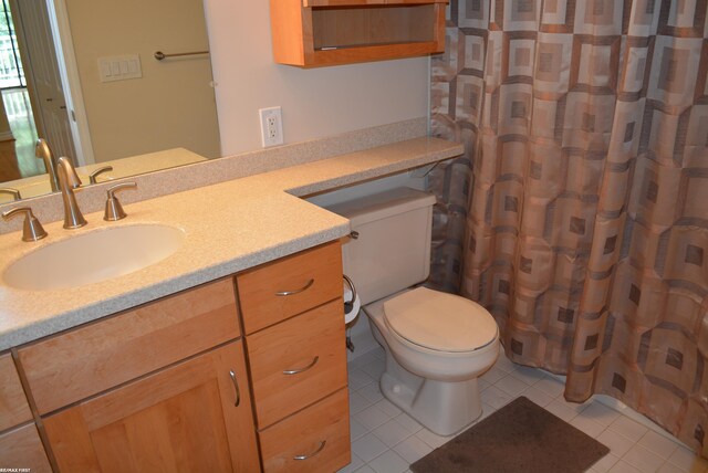 2423 Birchcrest Ct, Sterling Heights, MI 48314 - full bathroom with vanity, toilet, tile patterned floors, and a shower with shower curtain
