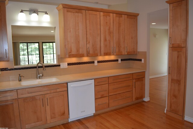 2423 Birchcrest Ct, Sterling Heights, MI 48314 - kitchen featuring dishwasher, a sink, light brown cabinetry, tasteful backsplash, and recessed lighting