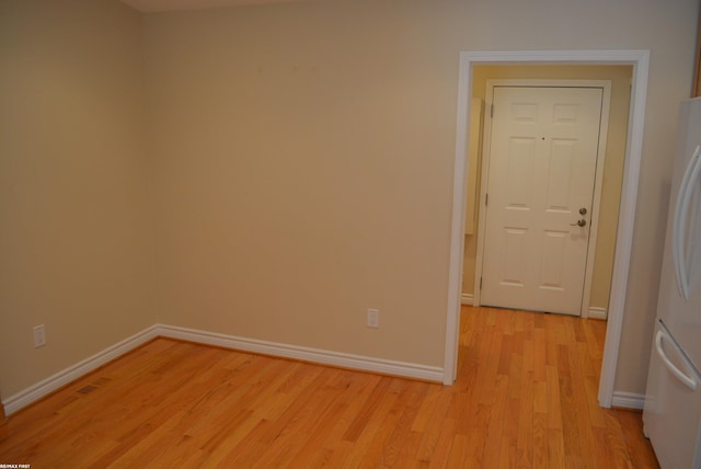 2423 Birchcrest Ct, Sterling Heights, MI 48314 - spare room with light wood finished floors and baseboards