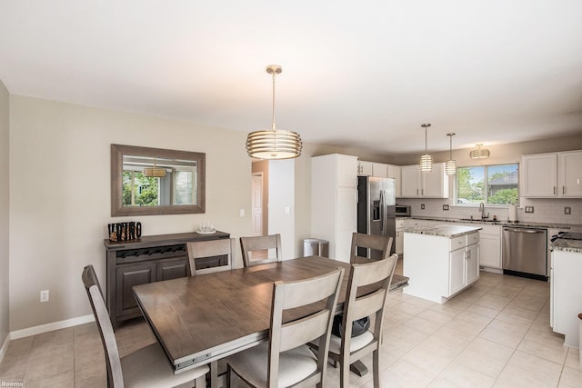 70226 Beebe St, Richmond, MI 48062 - dining area with light tile patterned flooring and baseboards