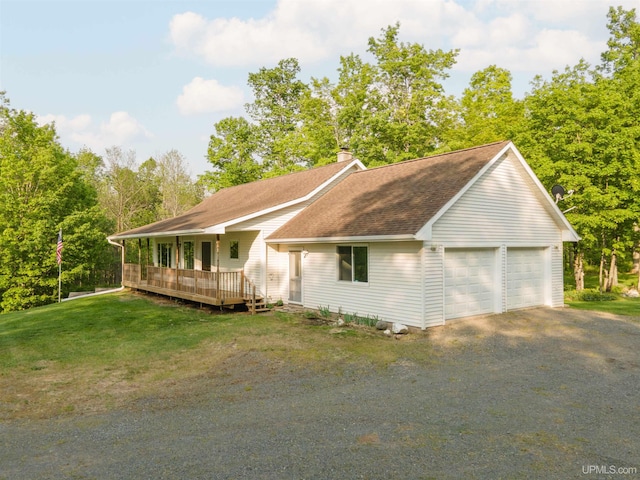 12826 Section 16 Rd, Watton, MI 49970 - view of front of house with a chimney, covered porch, a garage, a front yard, and roof with shingles