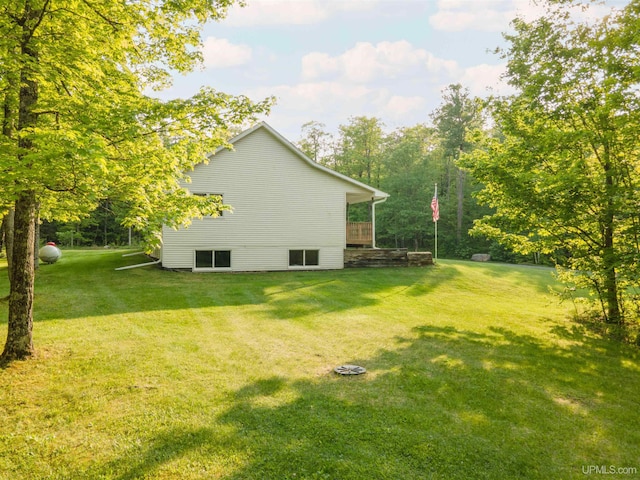 12826 Section 16 Rd, Watton, MI 49970 - view of side of home with a lawn