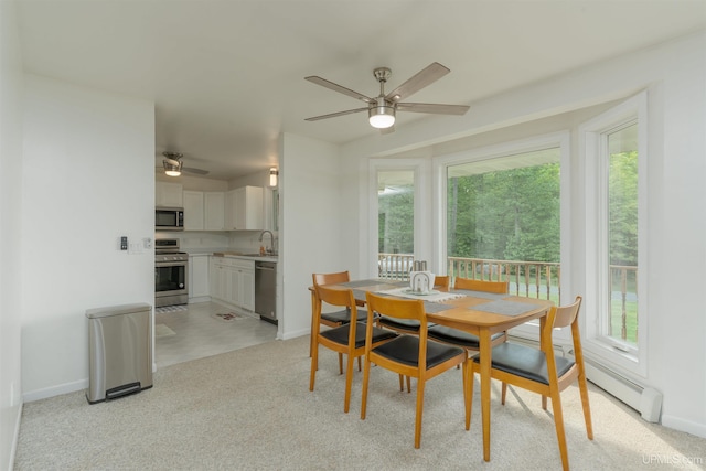 12826 Section 16 Rd, Watton, MI 49970 - dining room with a ceiling fan and baseboards