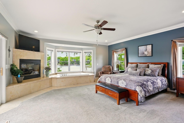 7859 Pine Ridge Dr, Clarkston, MI 48346 - bedroom with multiple windows, crown molding, recessed lighting, a tile fireplace, and carpet
