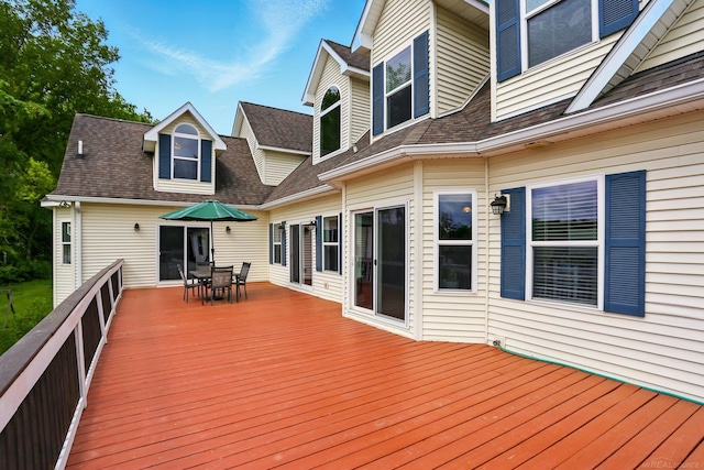 7859 Pine Ridge Dr, Clarkston, MI 48346 - wooden terrace featuring outdoor dining space