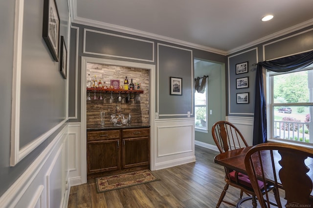 7859 Pine Ridge Dr, Clarkston, MI 48346 - indoor bar with a decorative wall, ornamental molding, plenty of natural light, and dark wood-type flooring