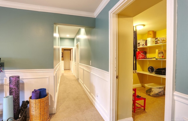 7859 Pine Ridge Dr, Clarkston, MI 48346 - hallway featuring ornamental molding, a wainscoted wall, light colored carpet, and a decorative wall