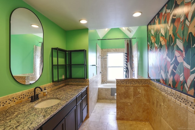 7859 Pine Ridge Dr, Clarkston, MI 48346 - bathroom featuring vanity, a bath, tiled shower, and recessed lighting