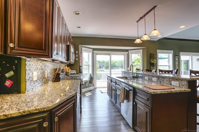 7859 Pine Ridge Dr, Clarkston, MI 48346 - kitchen with a sink, appliances with stainless steel finishes, healthy amount of natural light, tasteful backsplash, and ornamental molding