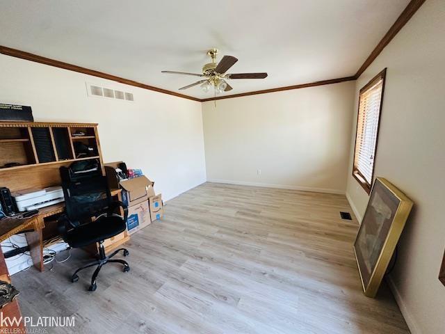 16754 Sarno Dr, Macomb, MI 48044 - office area featuring wood finished floors, ornamental molding, ceiling fan, and baseboards